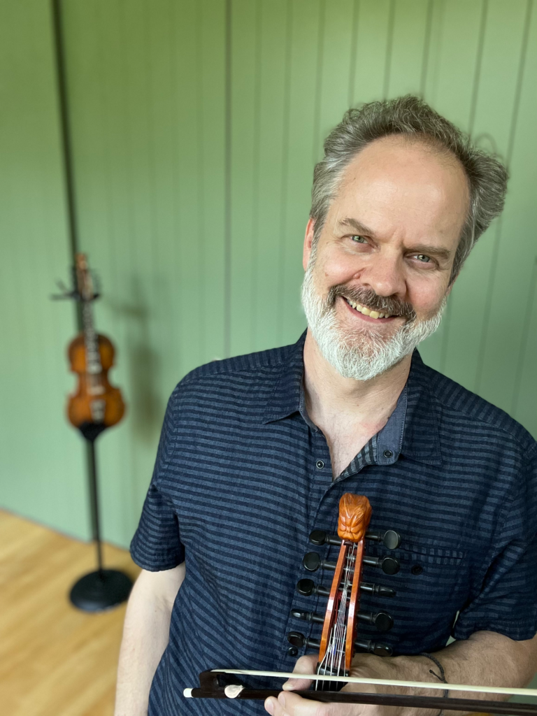 Dan Trueman holding a violin